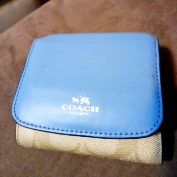Coach Handbags - Blue and Coach logo print leather wallet.